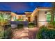 Beautifully landscaped front yard with stone pathway leading to the home's inviting entrance at 22912 N San Ramon Ct, Sun City West, AZ 85375
