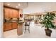 Open-concept floor plan with breakfast bar, dining area and living room, perfect for modern living at 22912 N San Ramon Ct, Sun City West, AZ 85375