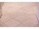Beautiful tile flooring with decorative border, adding charm and elegance to the space at 22912 N San Ramon Ct, Sun City West, AZ 85375