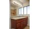 Bathroom featuring a sink and a large mirror at 2533 E Flower St, Phoenix, AZ 85016