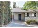 Charming single story home with a covered carport, lush landscaping and an inviting front entrance at 2533 E Flower St, Phoenix, AZ 85016