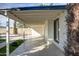 Covered patio with tile flooring showcasing a view of the pool and backyard at 2533 E Flower St, Phoenix, AZ 85016