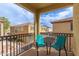 Balcony view showcasing a charming outdoor seating area with neighborhood views at 2754 S Sulley Dr # 103, Gilbert, AZ 85295