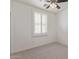 Bedroom with ceiling fan and plantation shutters to filter natural light at 2754 S Sulley Dr # 103, Gilbert, AZ 85295