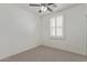 A bright bedroom features neutral carpet and natural light at 2754 S Sulley Dr # 103, Gilbert, AZ 85295