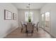 Cozy dining room featuring a stylish table, chairs, and bright natural light at 2754 S Sulley Dr # 103, Gilbert, AZ 85295