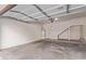 Spacious garage with painted walls and ceiling, ready for vehicles and storage at 2754 S Sulley Dr # 103, Gilbert, AZ 85295