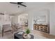 Open-concept living area with stylish furniture and seamless transition to the dining space at 2754 S Sulley Dr # 103, Gilbert, AZ 85295