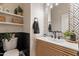 Contemporary half-bath featuring stylish fixtures, a modern vanity, and decorative accents at 2939 W Sunshine Butte Dr, San Tan Valley, AZ 85144