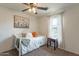 Bright bedroom with a daybed, soft neutral tones, and a window that brings in natural light at 2939 W Sunshine Butte Dr, San Tan Valley, AZ 85144