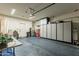 Spacious garage with ample storage cabinets and a clean, organized layout at 2939 W Sunshine Butte Dr, San Tan Valley, AZ 85144