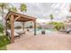 Inviting backyard pool with a charming gazebo, perfect for entertaining and relaxing at 2939 W Sunshine Butte Dr, San Tan Valley, AZ 85144