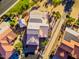 Stunning aerial view of home, highlighting solar panels, landscaping, and community pool at 3150 N 150Th Dr, Goodyear, AZ 85395