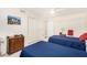 This bedroom features two twin beds with blue bedding and a castle picture, and a closet at 3150 N 150Th Dr, Goodyear, AZ 85395