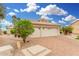 Beautiful single-Gathering home with manicured landscaping and a spacious three-car garage at 3150 N 150Th Dr, Goodyear, AZ 85395
