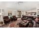 Spacious living room featuring an open floor plan with comfortable seating and plenty of natural light at 3150 N 150Th Dr, Goodyear, AZ 85395
