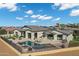 Amazing home featuring a refreshing swimming pool, comfortable lounge chairs, and a serene patio area for outdoor relaxation at 3842 E Alameda Ln, Gilbert, AZ 85298