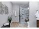 Luxurious bathroom showcasing a glass enclosed shower and designer finishes at 3842 E Alameda Ln, Gilbert, AZ 85298