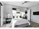 Beautiful bedroom featuring a ceiling fan, gray walls, ensuite, and a modern design aesthetic at 3842 E Alameda Ln, Gilbert, AZ 85298