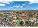 Aerial view of community waterpark, pool, and sports courts at 3842 E Alameda Ln, Gilbert, AZ 85298