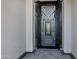 Close-up view of the black metal front door at 3842 E Alameda Ln, Gilbert, AZ 85298