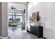 Inviting foyer with stylish console table, art, and view into bright living area at 3842 E Alameda Ln, Gilbert, AZ 85298