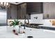 Close-up of kitchen island showcasing quartz countertops and modern fixtures at 3842 E Alameda Ln, Gilbert, AZ 85298