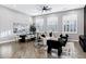 Open-concept living room with plantation shutters and a spacious seating area at 3842 E Alameda Ln, Gilbert, AZ 85298