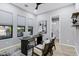 Cozy home office featuring a sleek desk, comfortable seating, a neutral color palette, and ample natural light at 3842 E Alameda Ln, Gilbert, AZ 85298