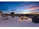 Relaxing pool and patio area with a fire pit, chaise lounges, and outdoor seating for ultimate outdoor enjoyment at 3842 E Alameda Ln, Gilbert, AZ 85298