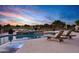 Serene pool area with lounge chairs and a tranquil view, perfect for relaxation and enjoying the outdoors at 3842 E Alameda Ln, Gilbert, AZ 85298