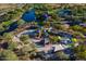 Aerial view of a colorful community playground with slides, climbing structures and splashpad at 40055 N High Noon Way, Anthem, AZ 85086