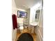 Small bathroom with a toilet, pedestal sink, and decorative wall art at 4446 E Woodridge Dr, Phoenix, AZ 85032