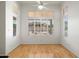 Bedroom with hardwood floors and plantation shutters offering natural light at 4446 E Woodridge Dr, Phoenix, AZ 85032