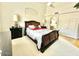 A bedroom with carpet flooring, a bed, and a high ceiling with ceiling fan at 4446 E Woodridge Dr, Phoenix, AZ 85032