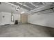 Spacious garage featuring ample storage, a water heater, and a clean, well-lit interior at 4446 E Woodridge Dr, Phoenix, AZ 85032