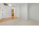 Bright living area with hardwood and carpet, featuring stairs and oak cabinets at 4446 E Woodridge Dr, Phoenix, AZ 85032