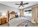 Comfortable bedroom with natural light, hardwood floors, and stylish furnishings at 4611 E Monterosa St, Phoenix, AZ 85018