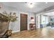 Elegant home entryway features hardwood floors, a decorative front door, and a view into a bright study at 4611 E Monterosa St, Phoenix, AZ 85018