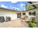 Outdoor patio area with brick pavers, comfortable seating and a grill at 4611 E Monterosa St, Phoenix, AZ 85018