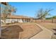 The backyard features a covered patio and is enclosed by a block wall at 5029 N 86Th Dr, Glendale, AZ 85305