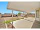 Spacious backyard with a covered patio area and ample room for outdoor activities and relaxation at 5029 N 86Th Dr, Glendale, AZ 85305