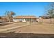 The home is a single story with a covered patio, a desert landscaped yard, and a sidewalk at 5029 N 86Th Dr, Glendale, AZ 85305