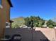 Enclosed backyard area featuring a patio with comfortable seating and scenic mountain views at 5436 W Chisum Trl, Phoenix, AZ 85083