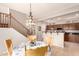 Cozy eat-in kitchen with bar and adjacent staircase at 5436 W Chisum Trl, Phoenix, AZ 85083