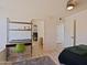 Relaxing bedroom with laminate floors and a modern desk at 5719 E Paradise Ln, Scottsdale, AZ 85254