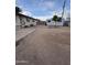 This backyard features a gravel ground covering and a shed at 5815 N 61St Ln, Glendale, AZ 85301