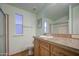 Well-lit bathroom with a large mirror, vanity and sink for a relaxing atmosphere at 67 S Amulet Ave, Mesa, AZ 85208