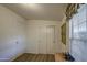 Comfortable bedroom featuring a closet, a well-lit window and vintage decor at 67 S Amulet Ave, Mesa, AZ 85208