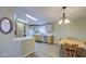 Bright open kitchen featuring modern appliances, and eat-in dining space at 67 S Amulet Ave, Mesa, AZ 85208